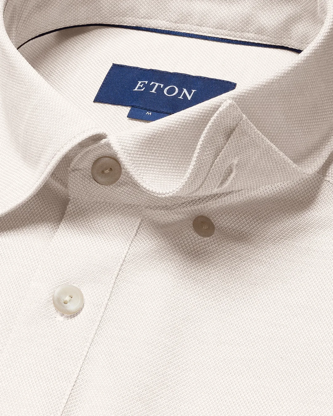 white-jersey-button-under-shot white-jersey-button-under-shot