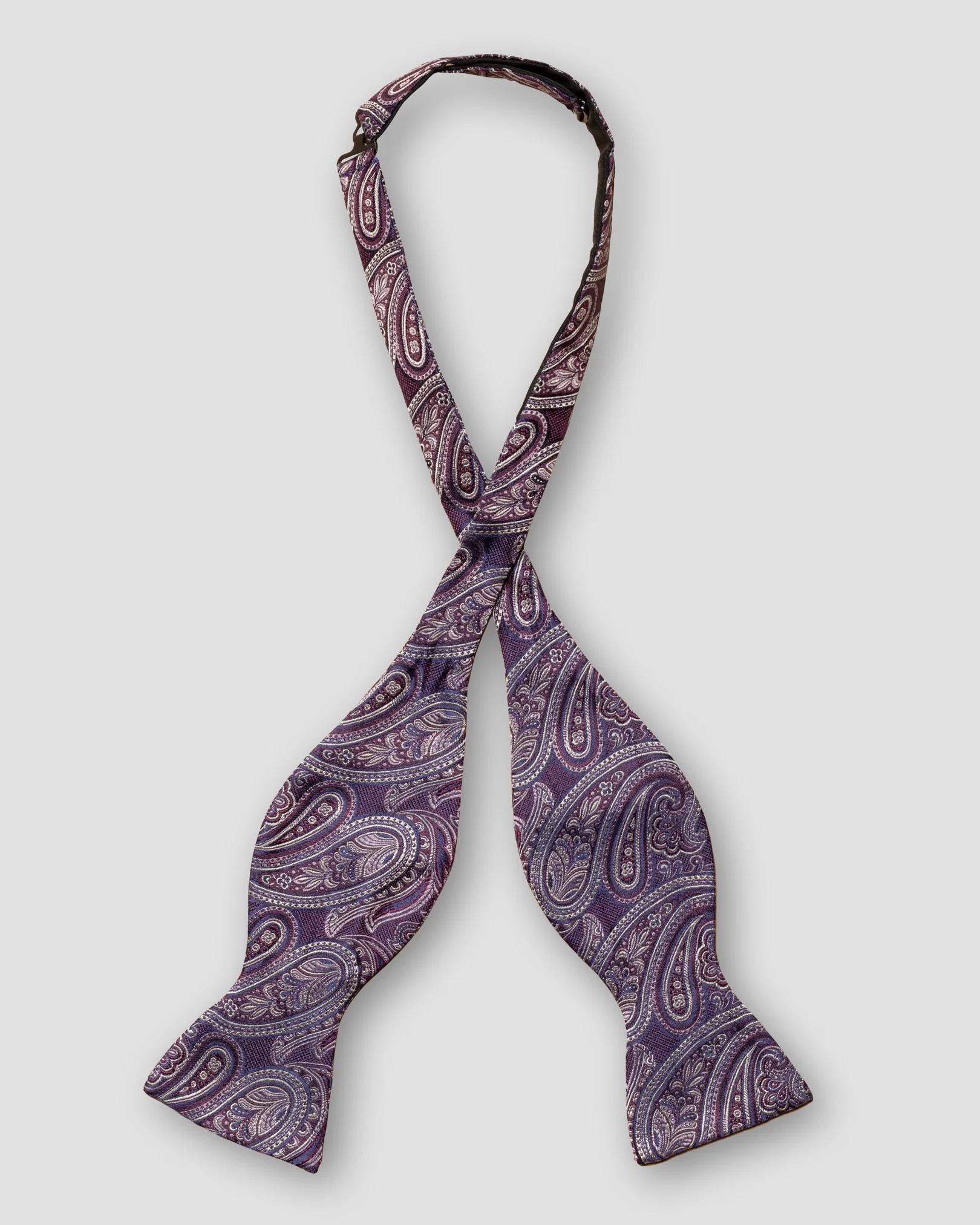 Eton - dark purple paisley bow tie