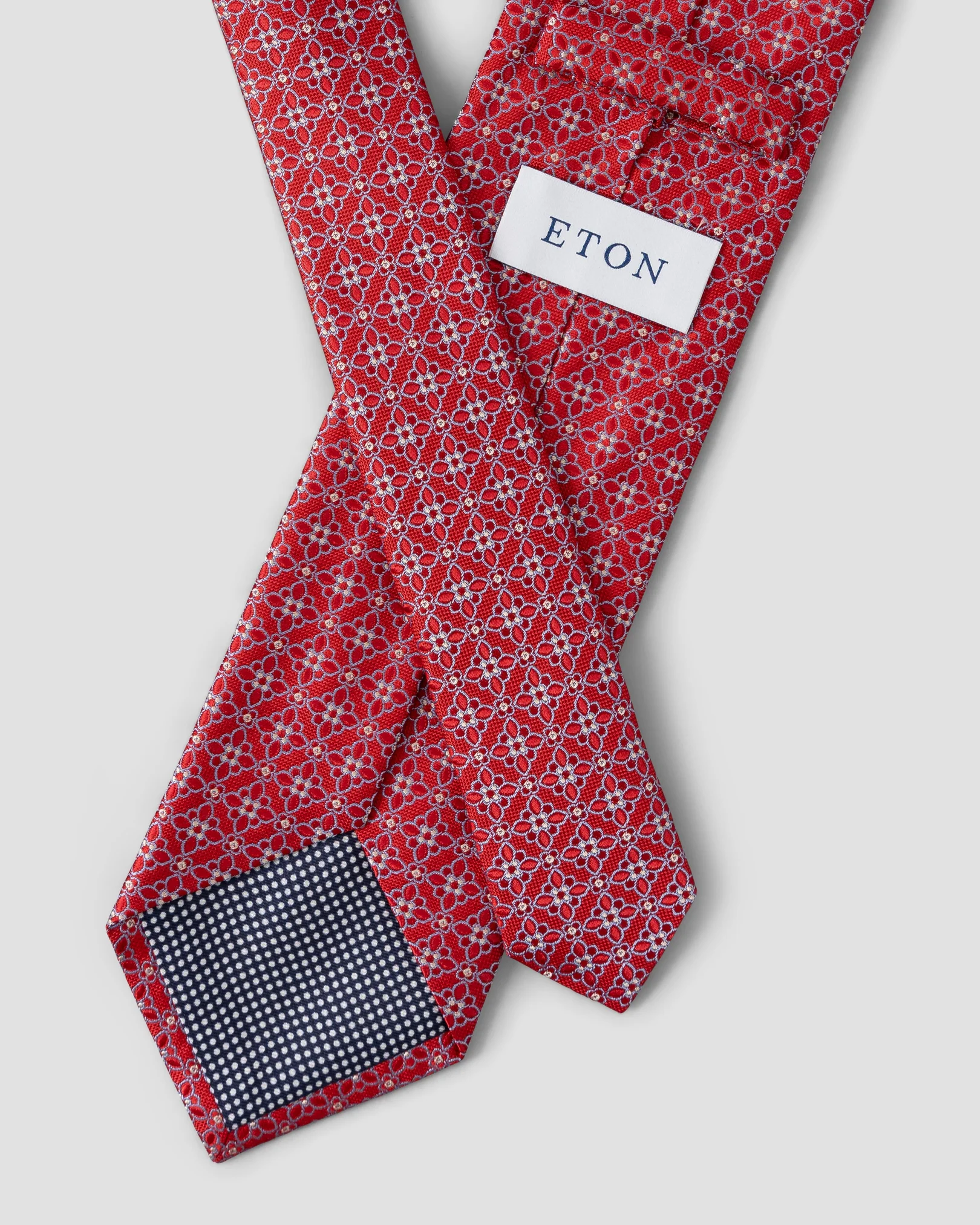 Cravate en soie rouge motifs floraux
