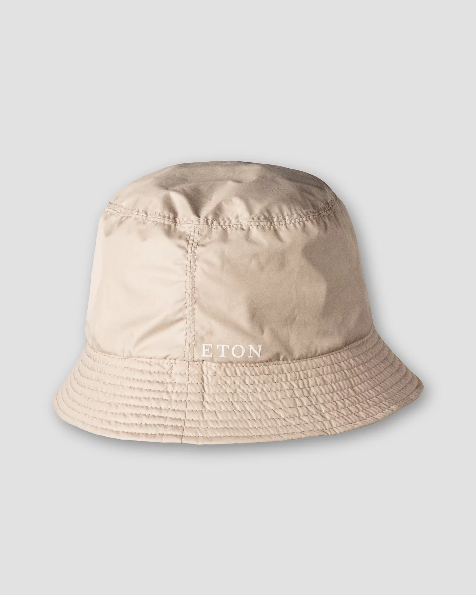 Eton - beige city print reversible bucket hat