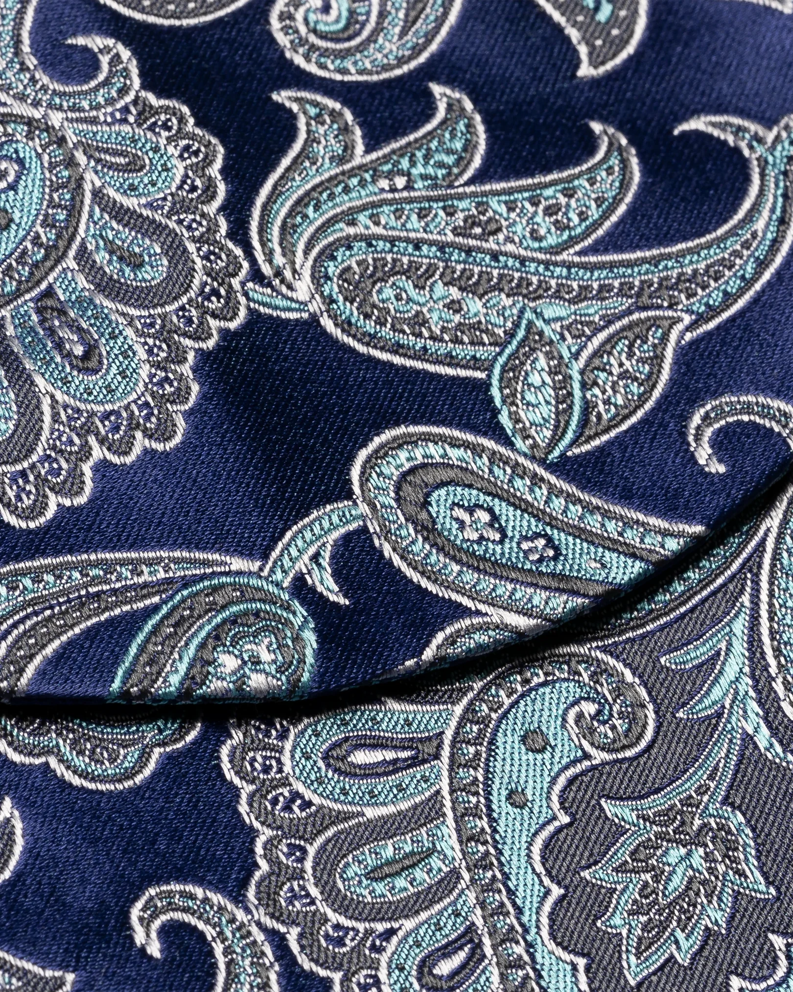 Eton - mid blue paisley silk bow tie self tied