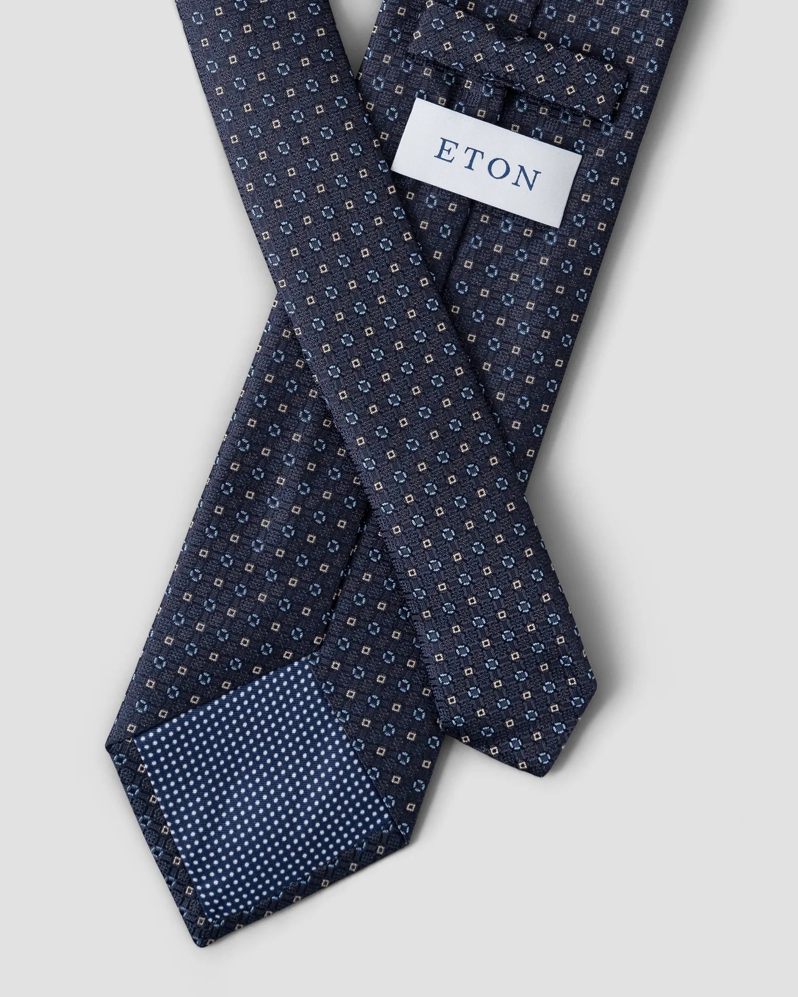 Cravate bleu marine en soie à imprimé géométrique
