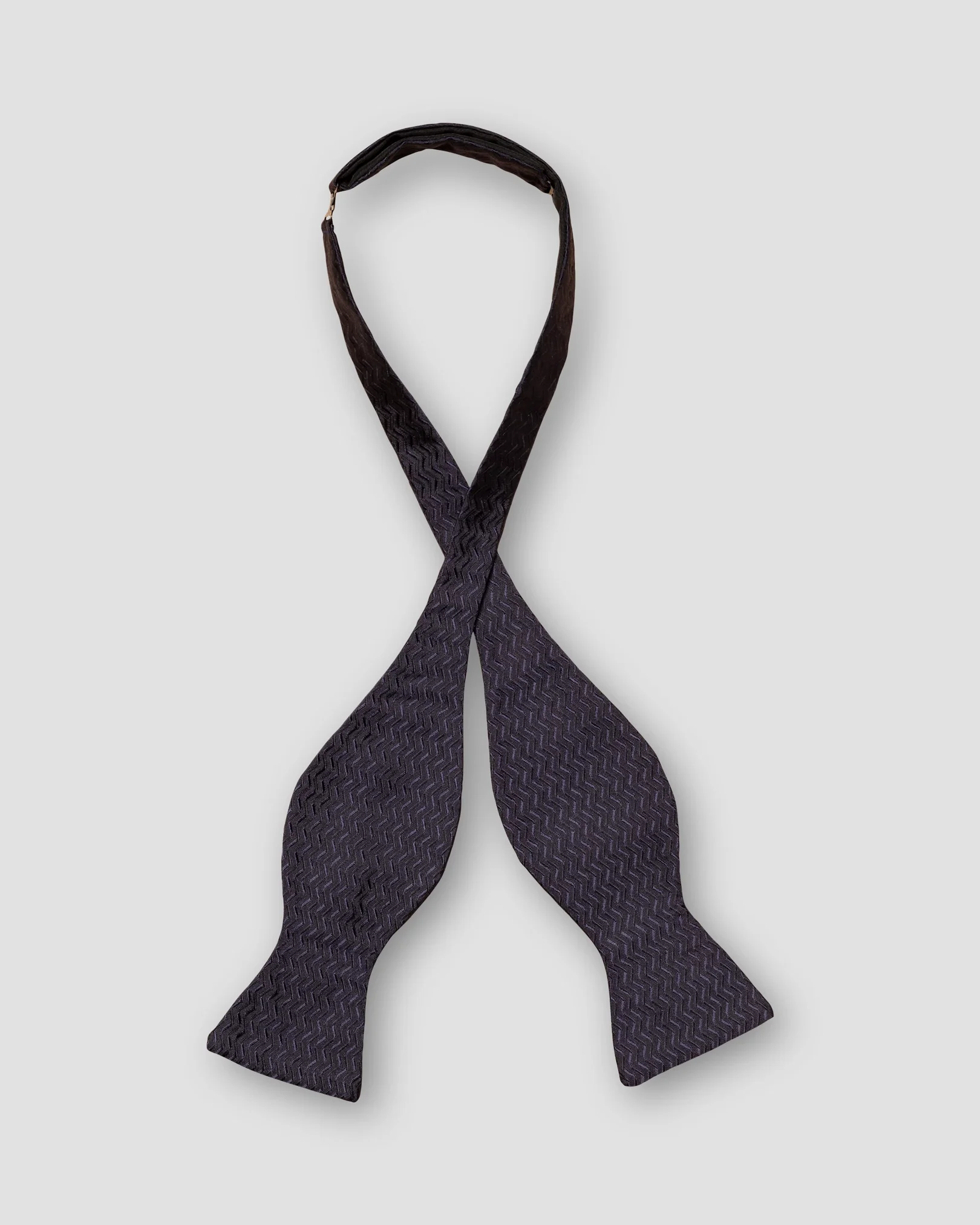 Eton - navy blue herringbone bow tie