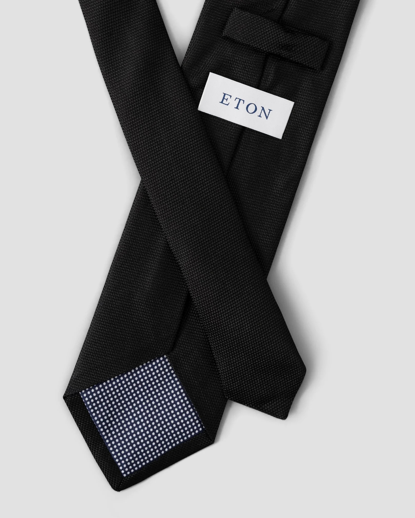 Svart våffelmönstrad slips