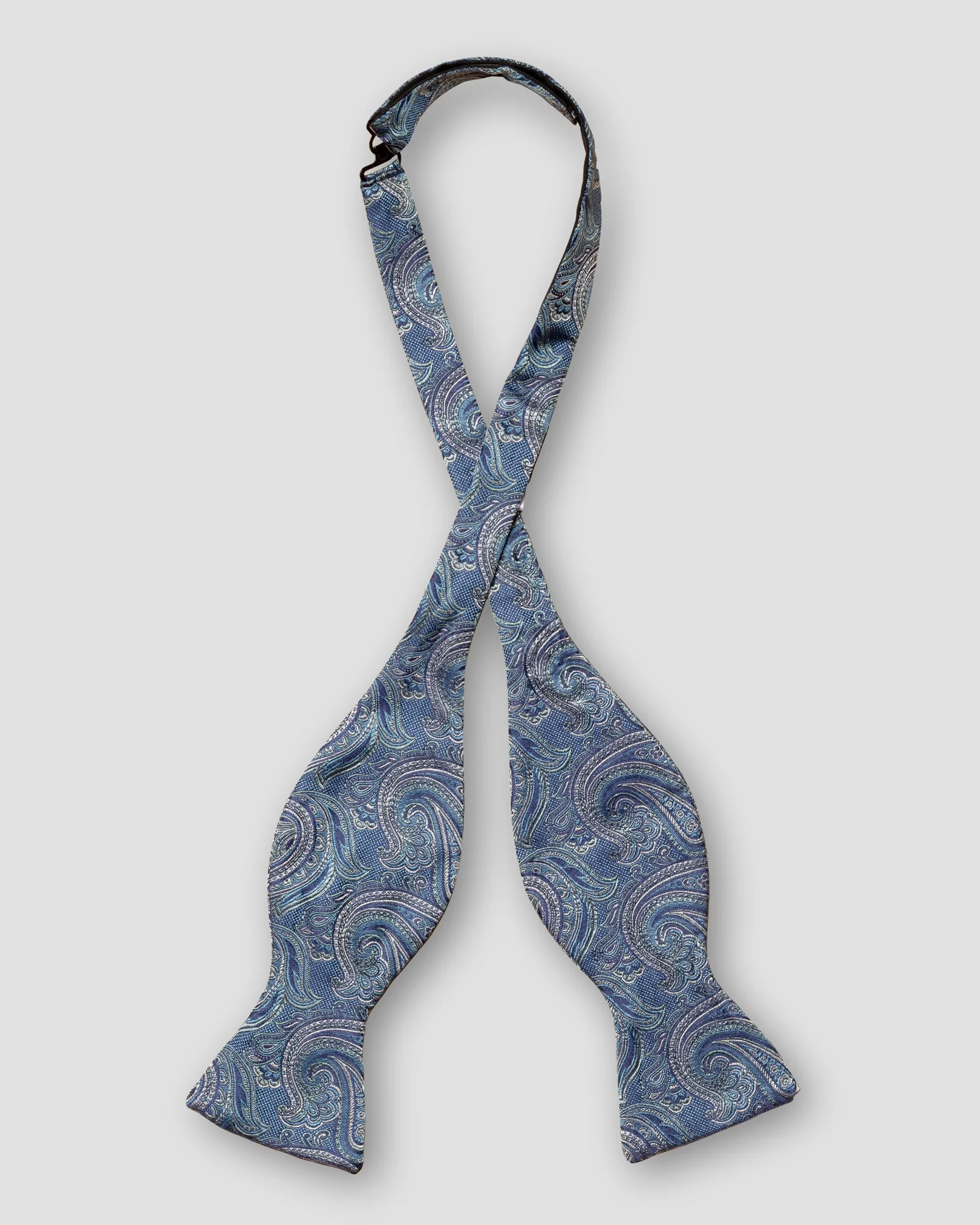 Eton - dark blue paisley bow tie