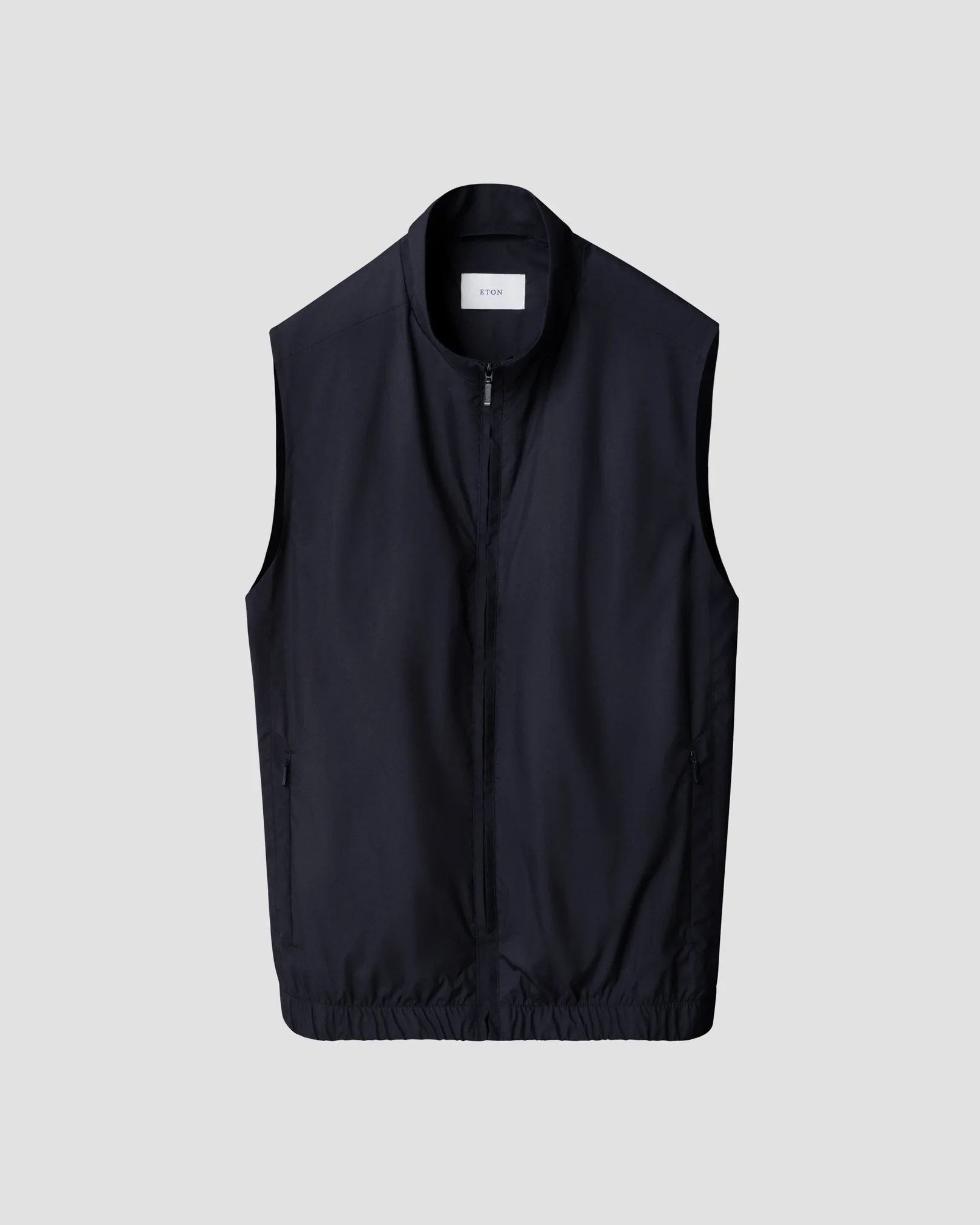 Eton - navy blue solid wind vest with elastic hem