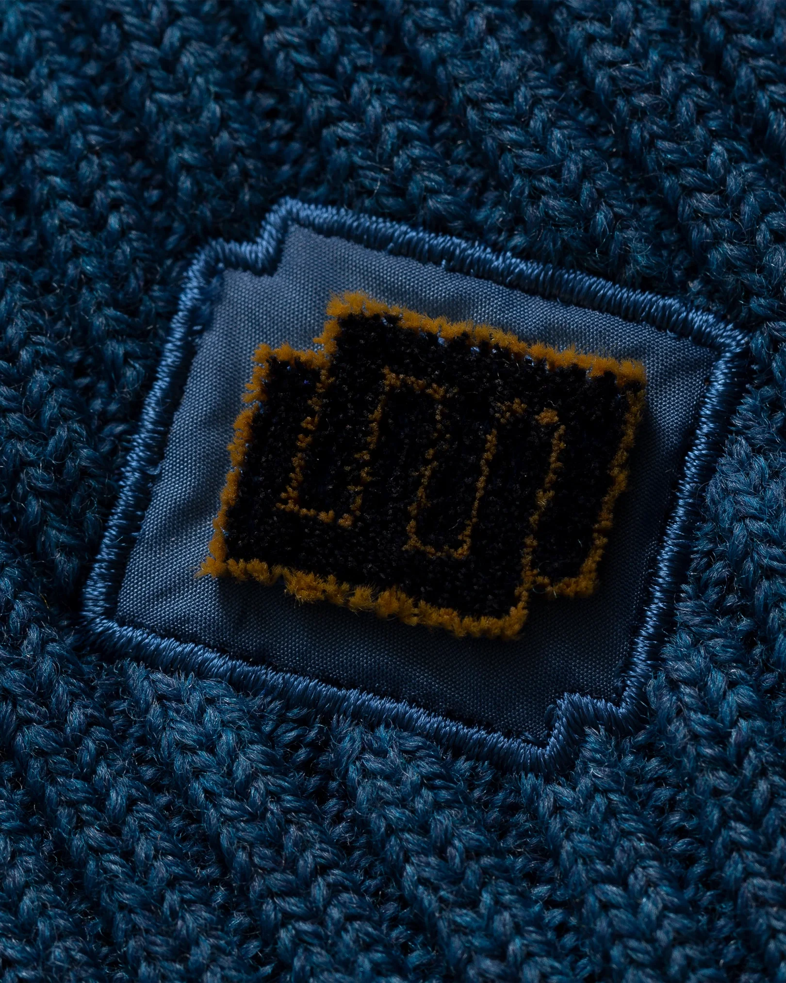 Eton - blue wool beanie logo detail