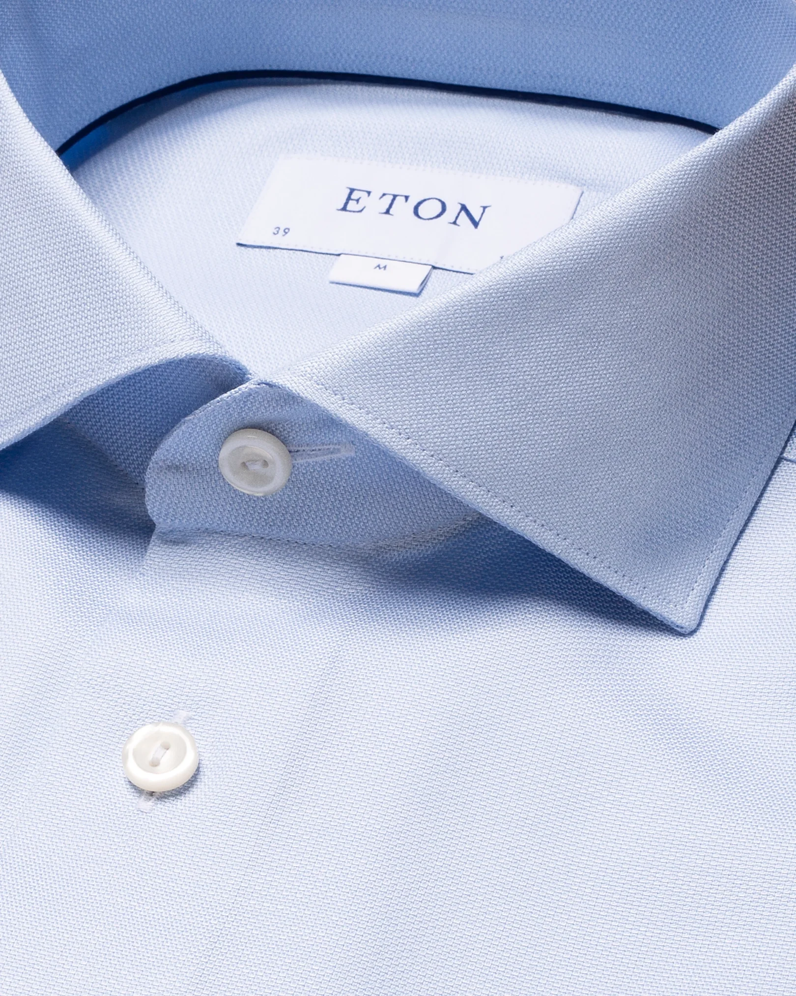 Eton - light blue cotton lyocell stretch wide spread rounded single one buttonhole slim