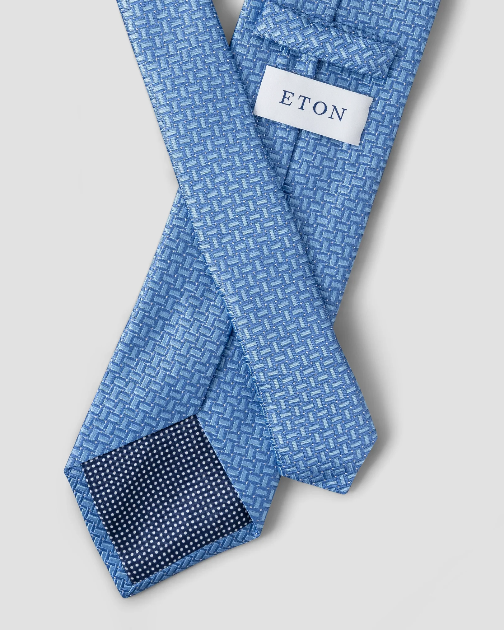 Cravate bleu clair en soie à imprimé géométrique