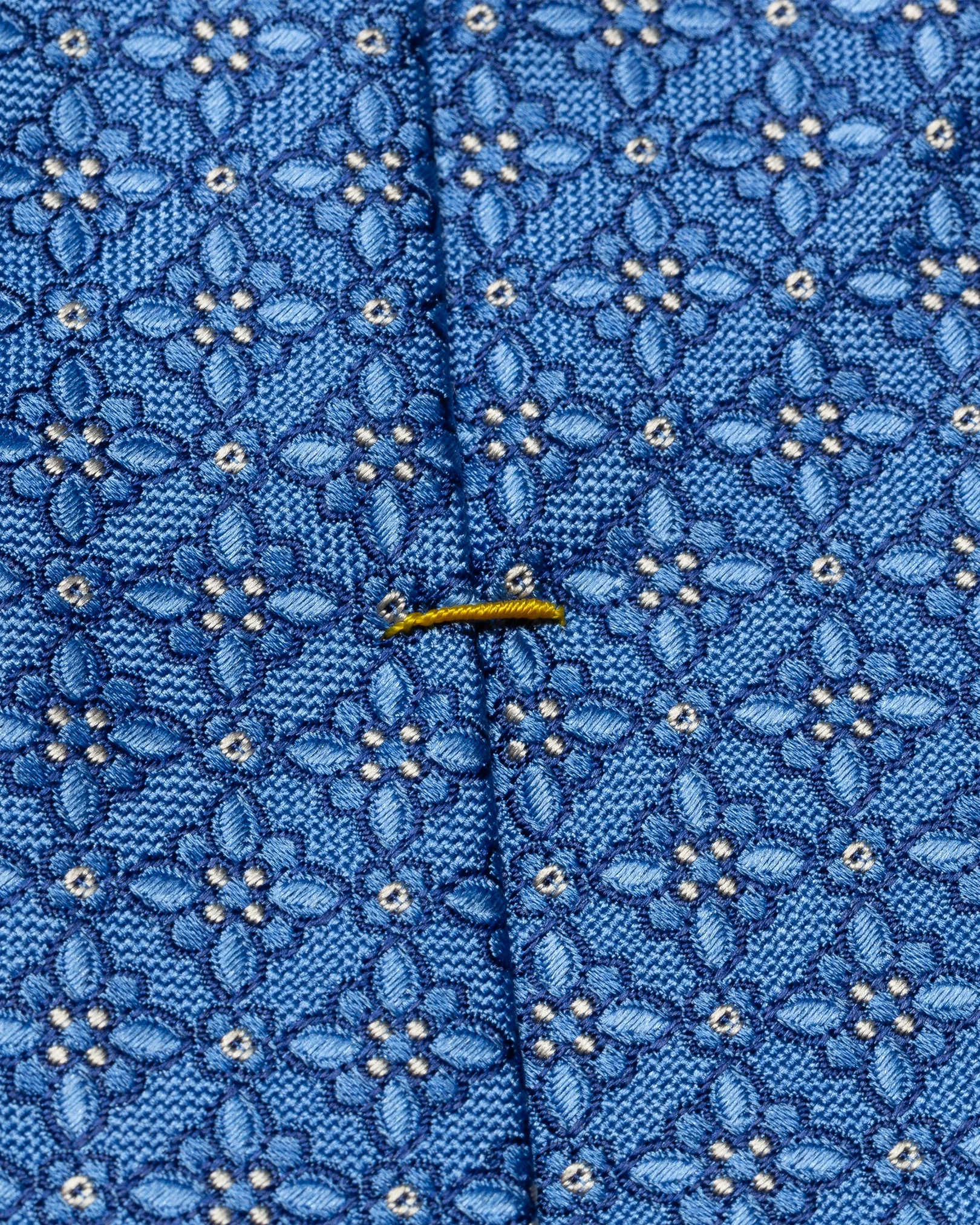 Cravate en soie bleu foncé motifs floraux