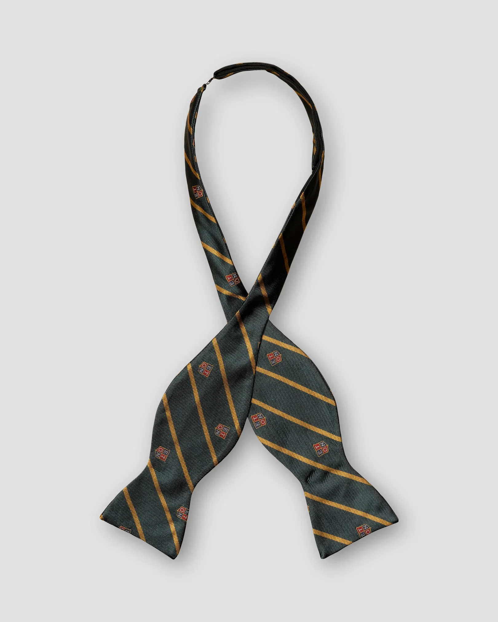 Eton - dark green bow tie self tied