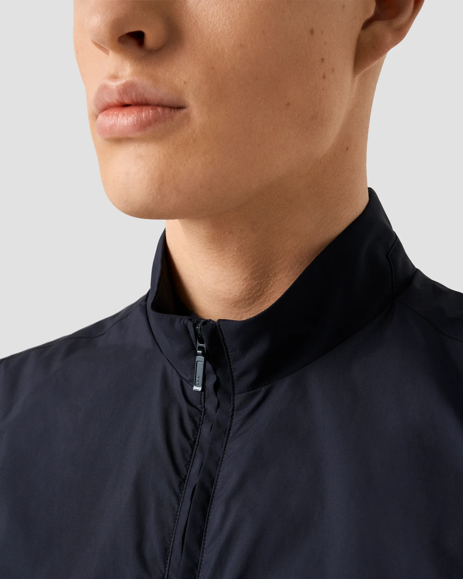 Eton - navy blue solid wind vest with elastic hem