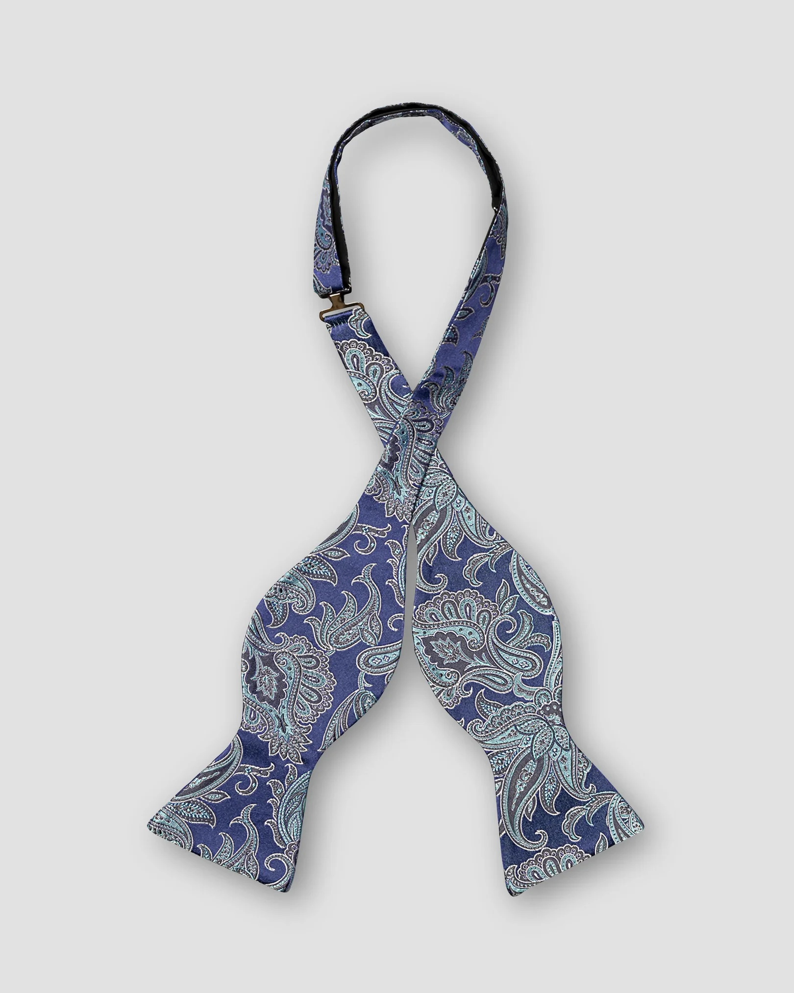 Eton - mid blue paisley silk bow tie self tied