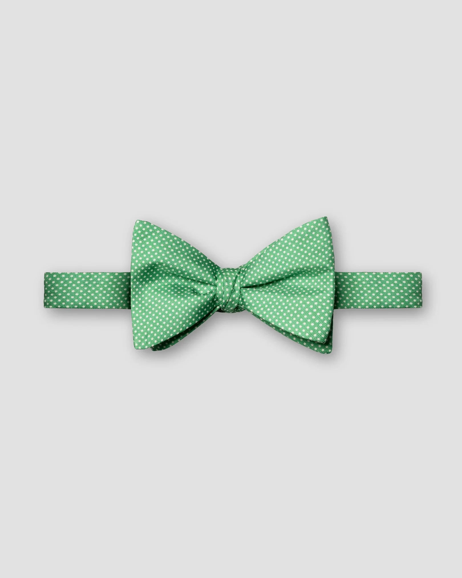 Eton - mid green polka dot print silk bow tie self tied