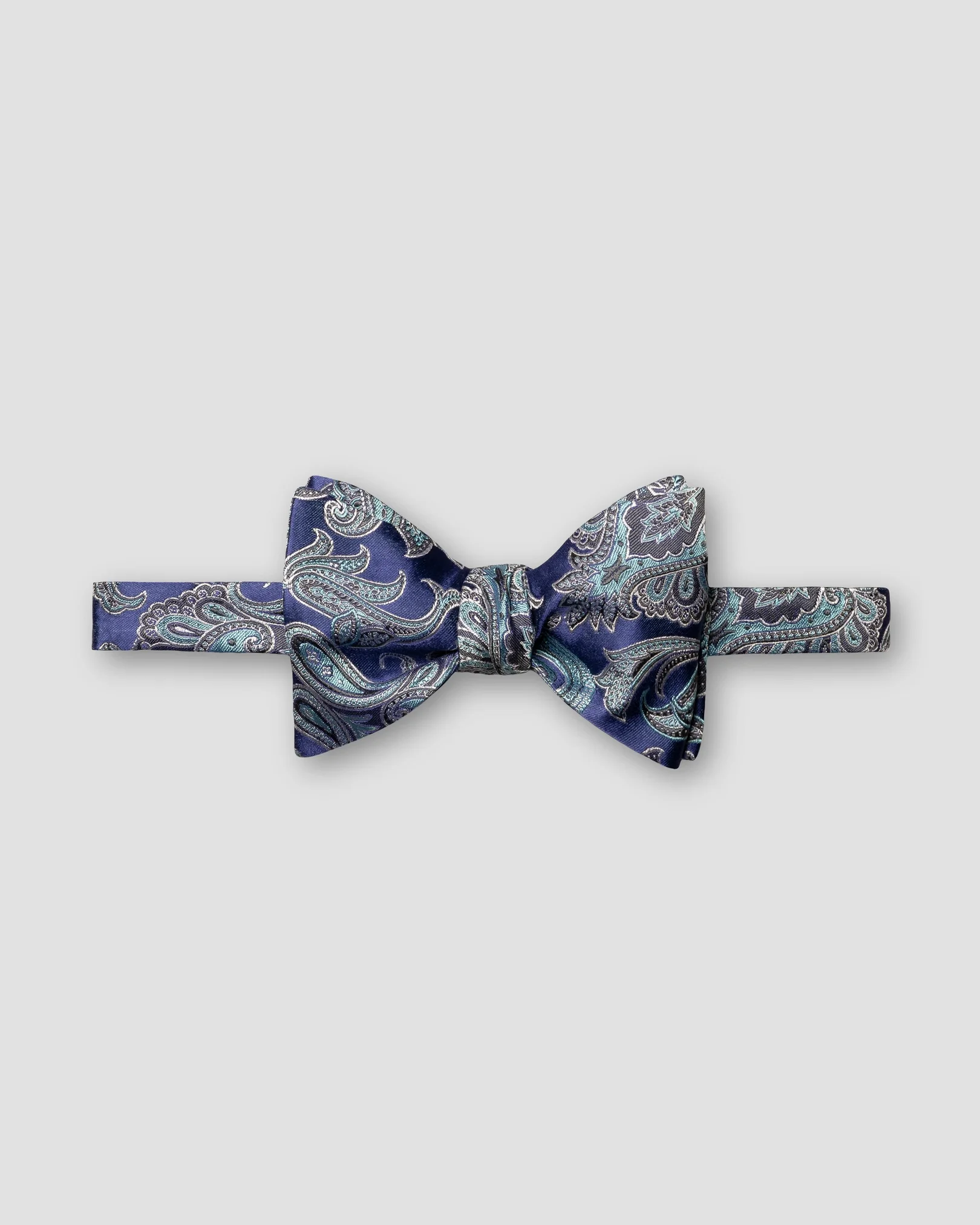 Eton - mid blue paisley silk bow tie self tied