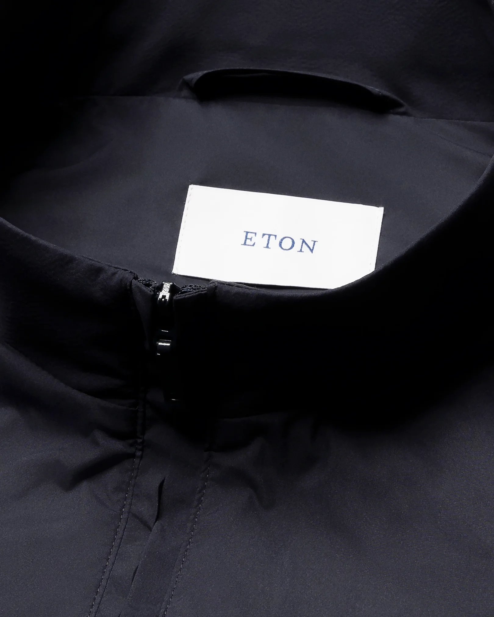 Eton - navy blue solid wind vest with elastic hem