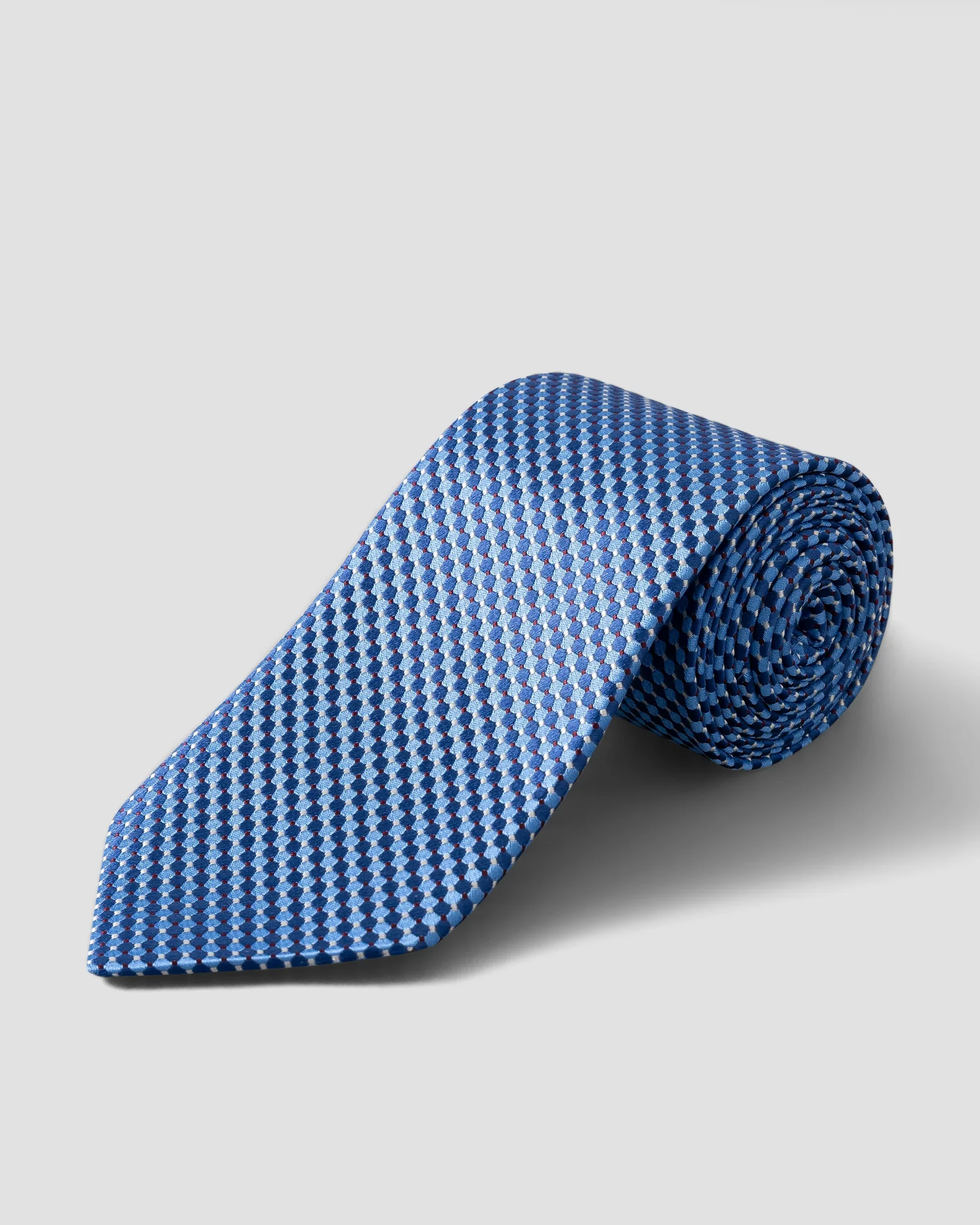 Cravate en soie bleue motifs géométriques