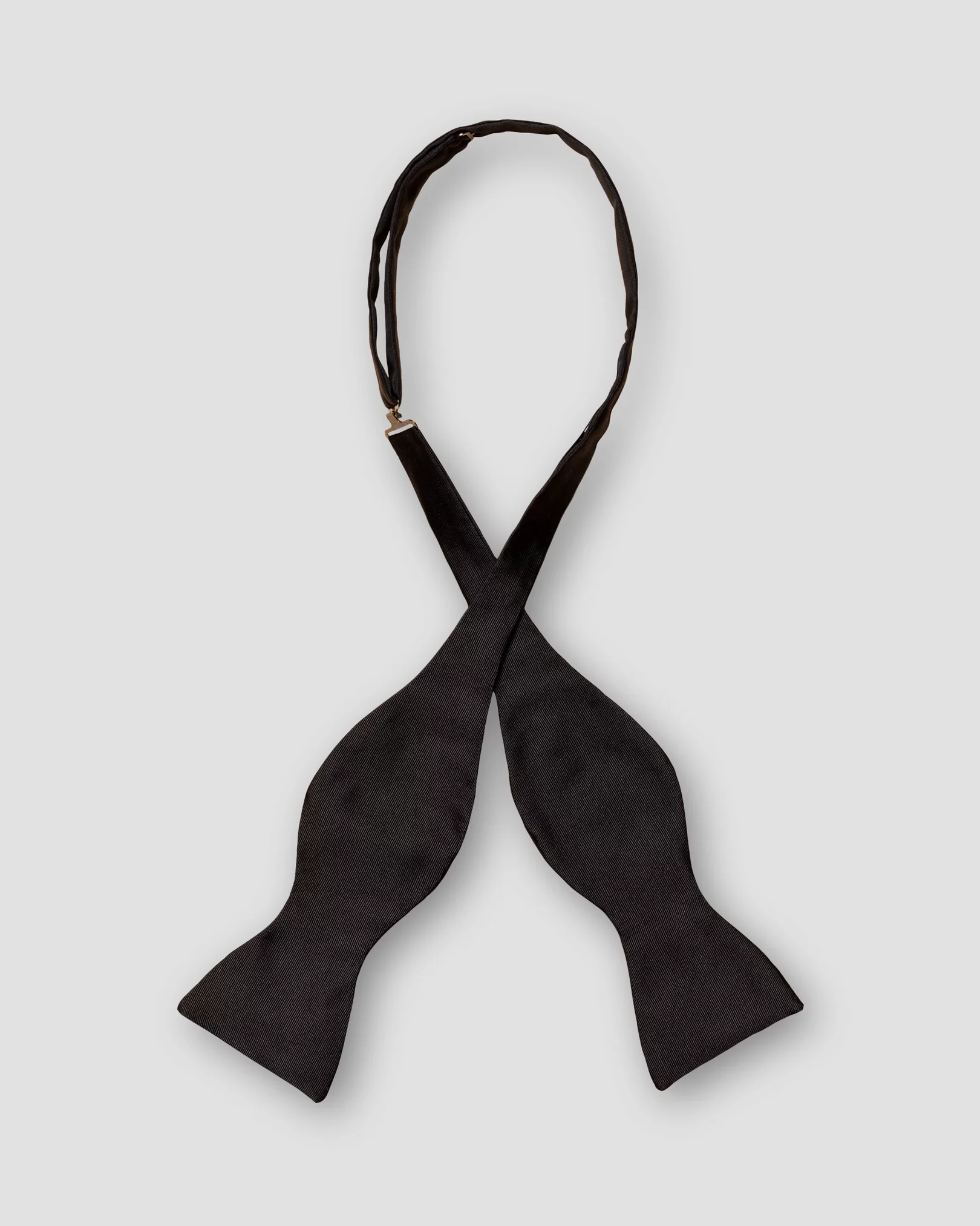 Eton - black bow tie self tied dressed