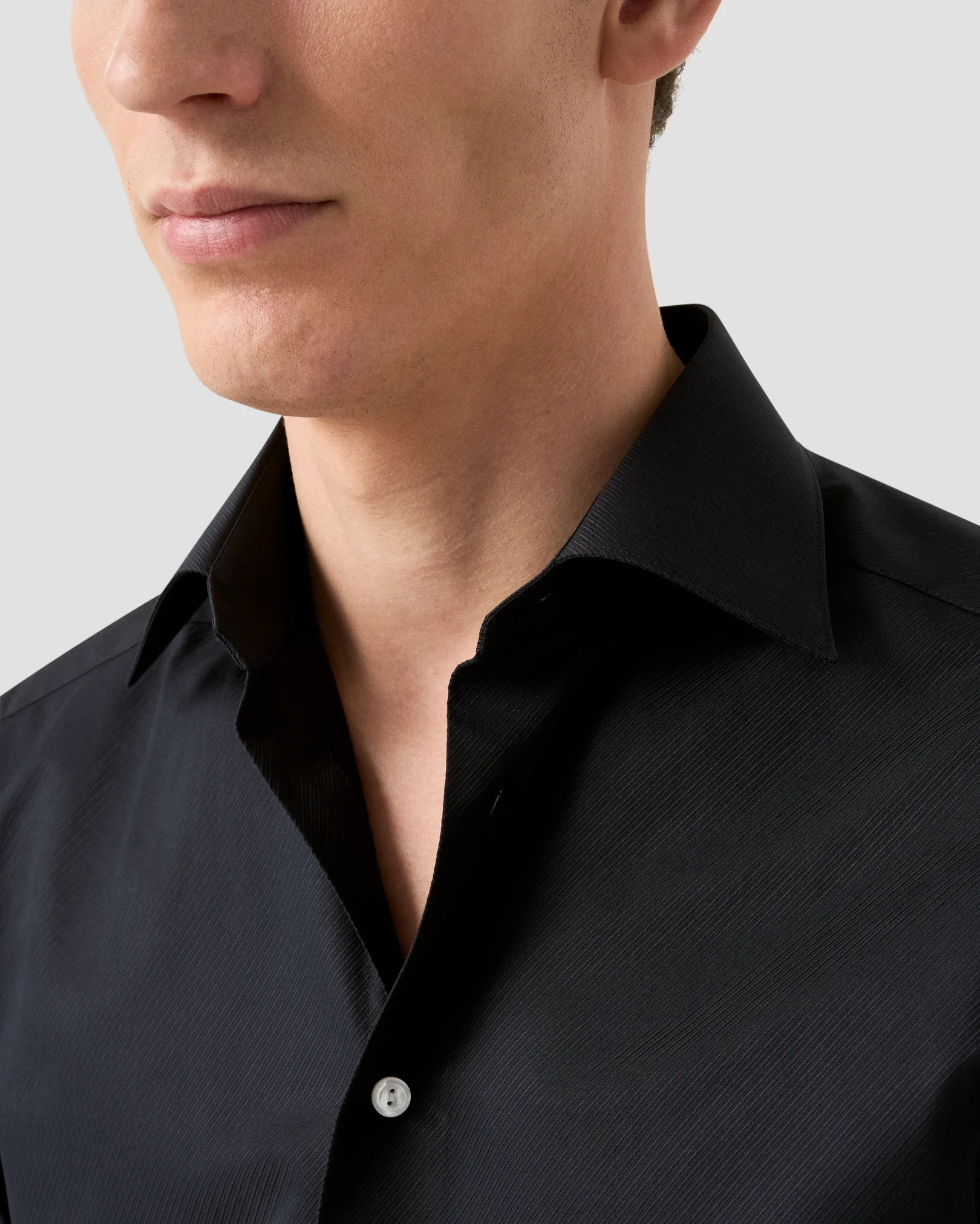 Eton - moderate cut away black twill